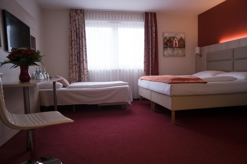 Hotel Roedelheimer Hof - Am Wasserturm Francfort-sur-le-Main Chambre photo