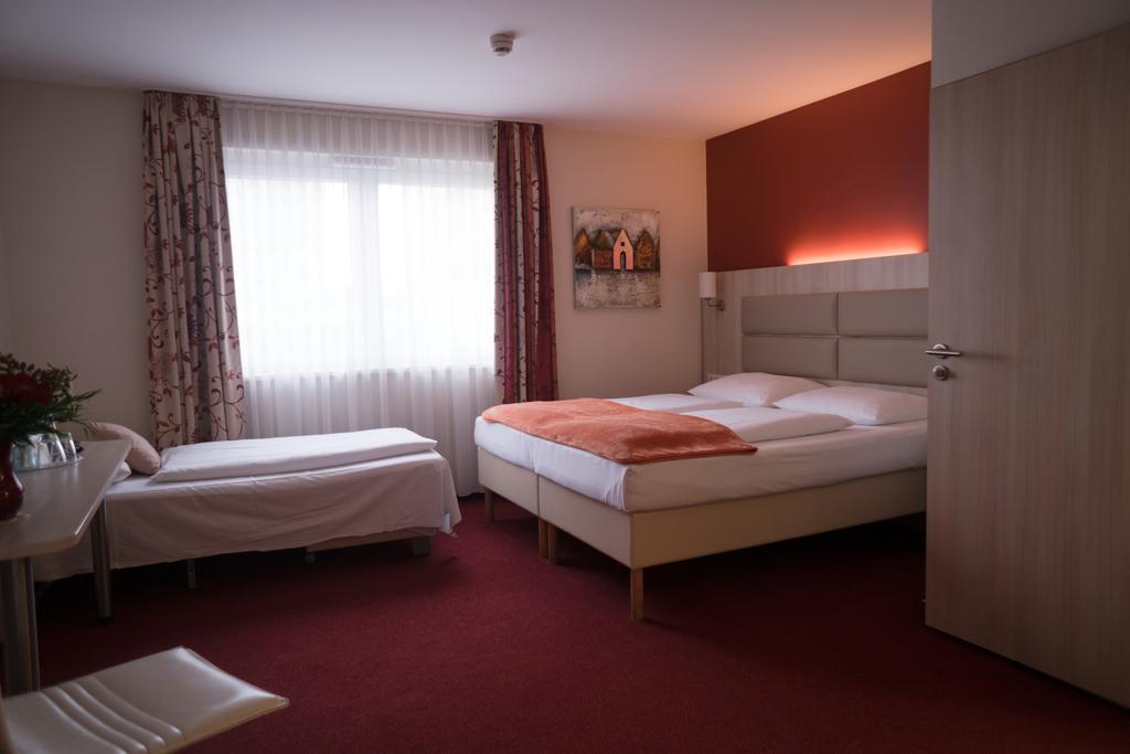 Hotel Roedelheimer Hof - Am Wasserturm Francfort-sur-le-Main Chambre photo